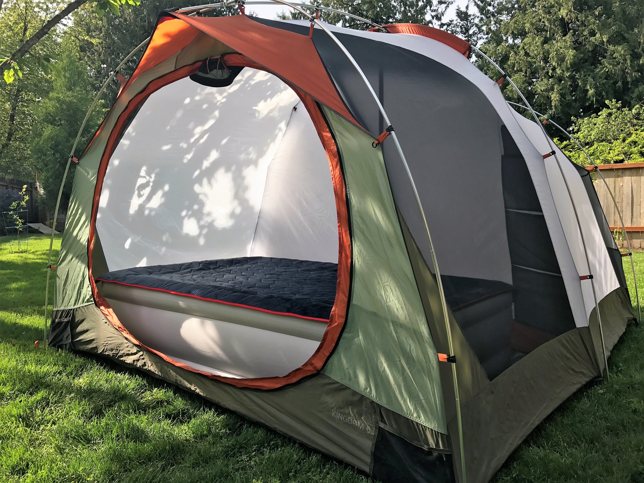 Twilight mattress topper on air mattress in a tent